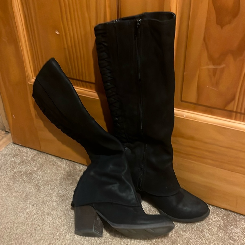 Gently used heeled boots.
